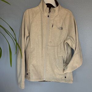THE NORTH FACE TNFAPEX jacket. Floral design. Wind guard waist strap. Size med